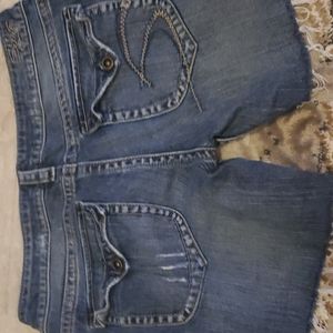 Silver cut off shorts